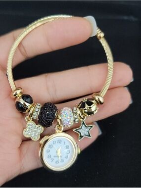 New Gold Tone Women's Charm Bracelet Watch with Black and Crystal Accents
